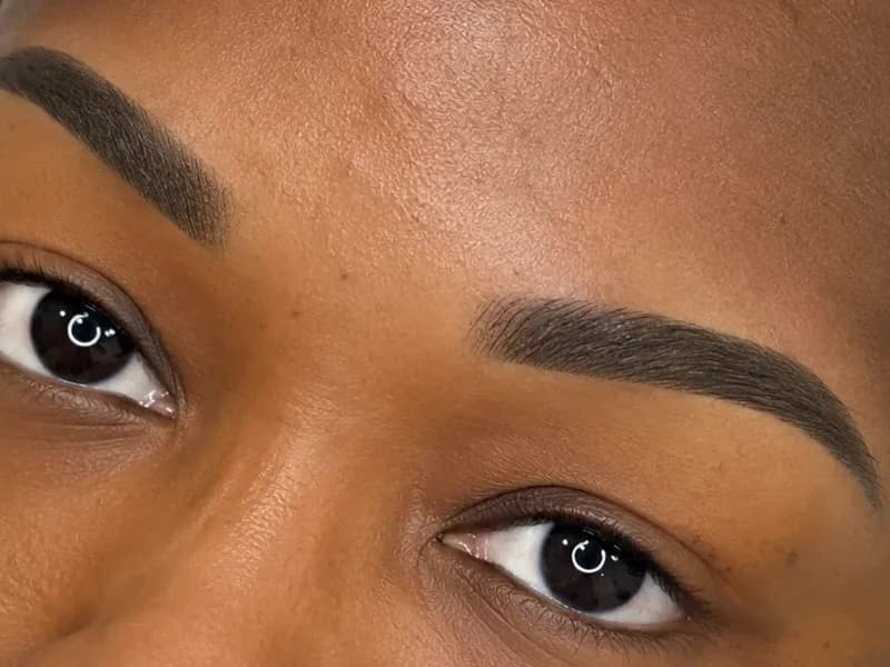 Close detail of healed permanent brow hair strokes