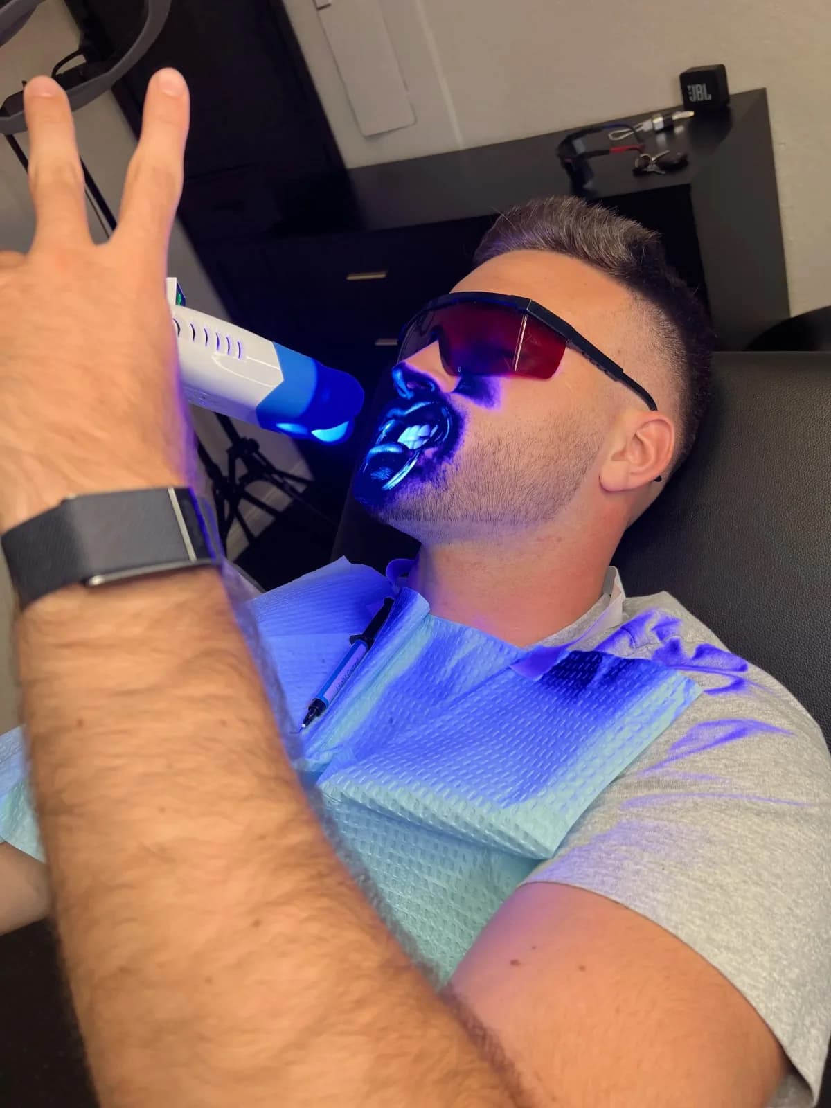 A teeth whitening session in progress at the studio
